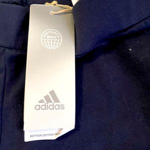 Black/ dark navy adidas leggings,  with light blue strip. Size small. Mid rise.